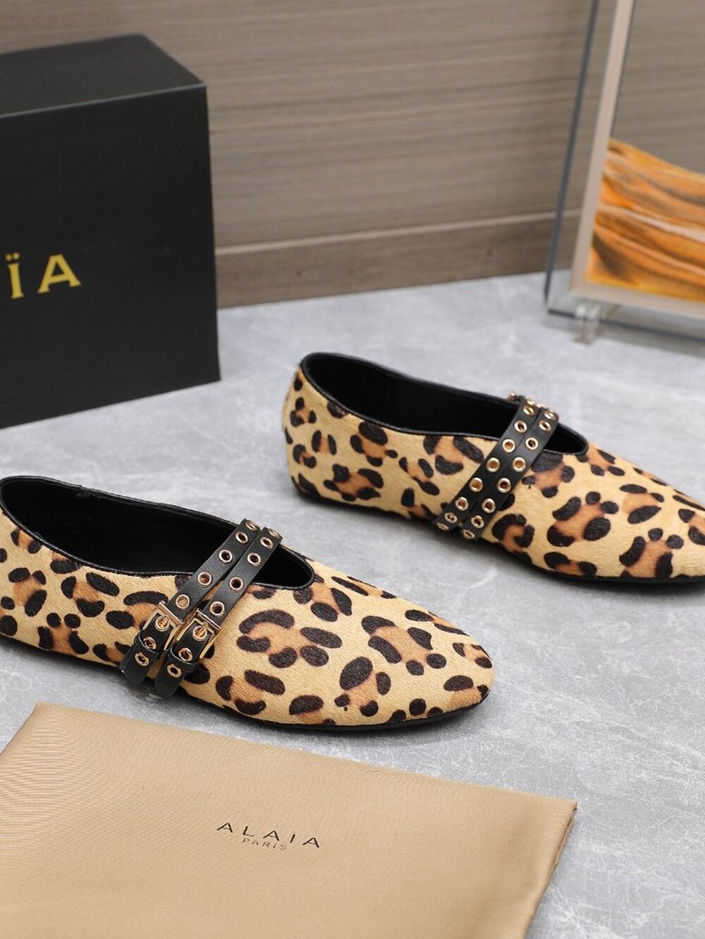 ALAÏA Leopard-Print Calf Hair Double-Buckle Mary Jane Flats - Picture 2 of 8